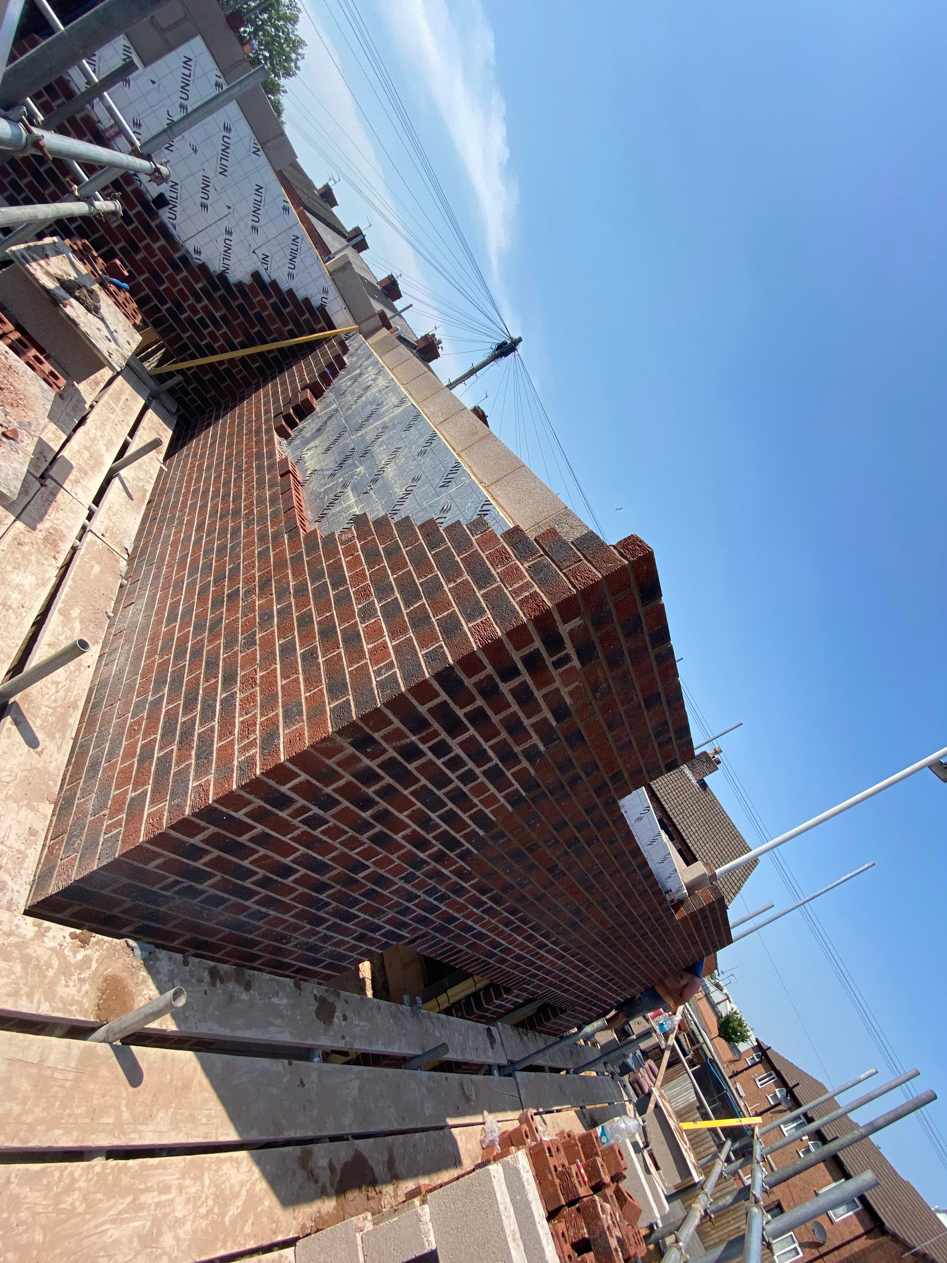 Commercial brickwork going up on the Birkenhead shop build, Wirral