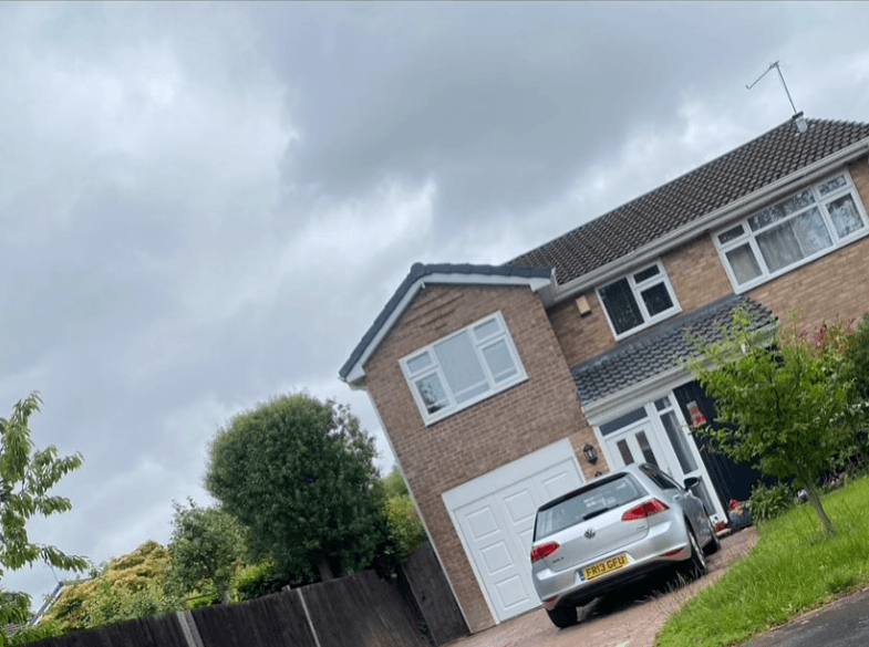 Garage conversion extension Wirral — completed rear extension with bifold doors
