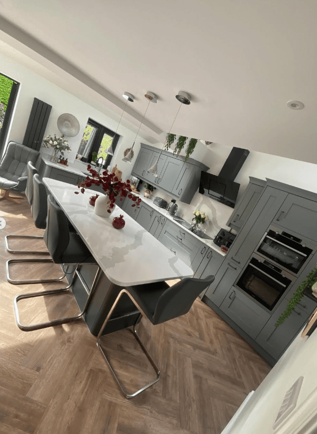 Kitchen extension Wirral — kitchen island with bar seating and full run