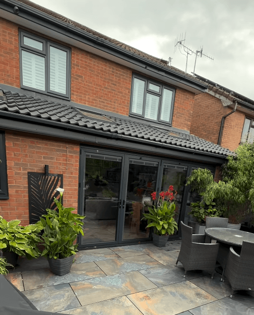 Kitchen extension Wirral — bifold doors and slate patio