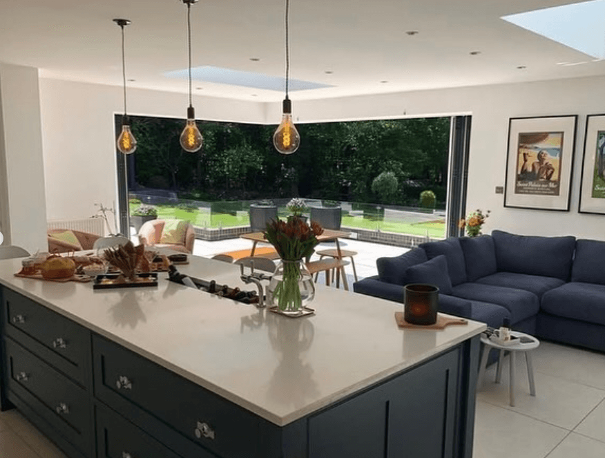 View through bifold glazing from kitchen to garden — Willaston extension